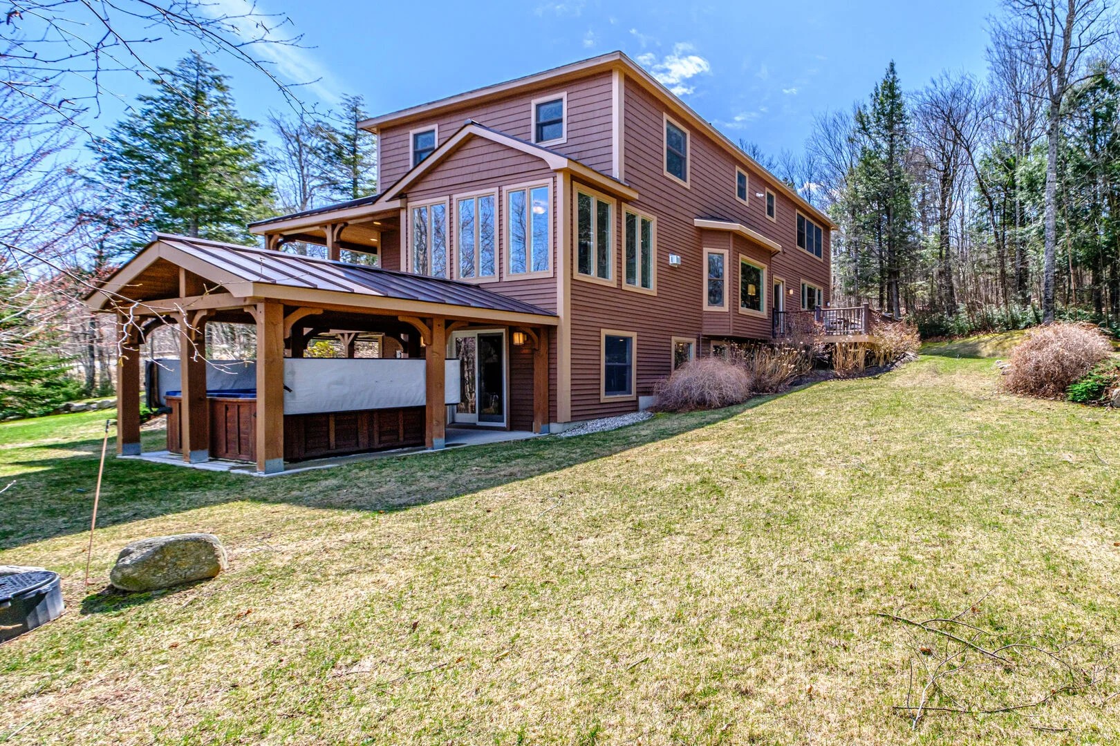 Rear exterior and hot tub pavilion